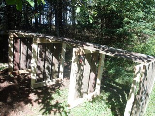 getting the frames attached to the back boards to make a compost factory