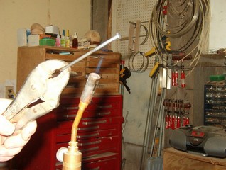 heat the other ennd with a propane torch   heat the other ennd with a propane torch