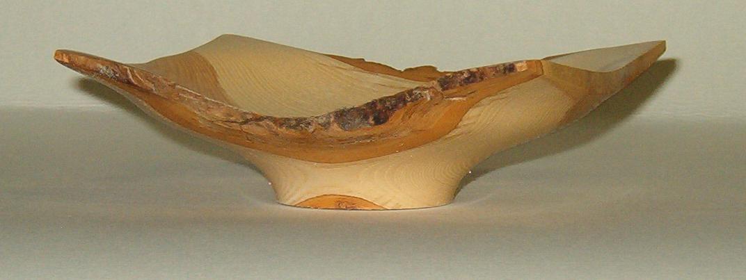 This ash bowl is about five inches square and 2 inches high 