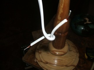 tie the cord in an overhead or &qot;underwriter's" knot
