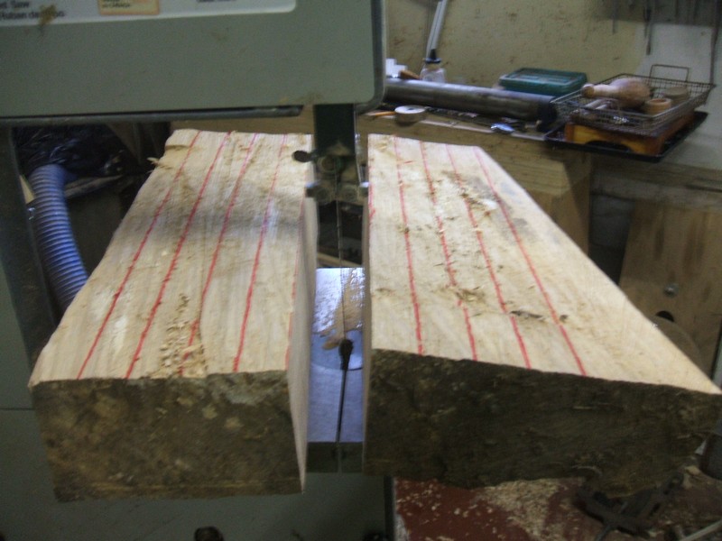 After the first five slabs from center have been cut, the grain 