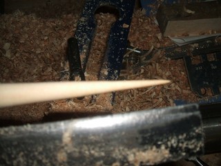 Back off the tail stock and point the taper 