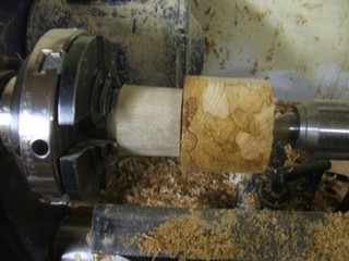 rounded down to between 2 1/8" and 2 1/4". 