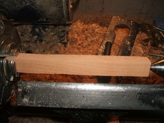  center point of the lathe tail center on the blank