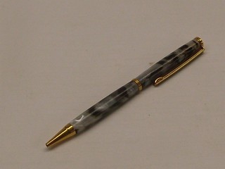 pearl acrylic with swirls of black pearl acrylic with swirls of black