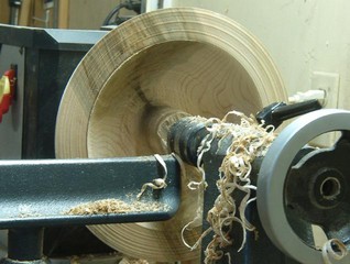 a tenon is left as the bowl is hollowed
